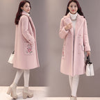 Women's mid-length faux lamb wool coat side view