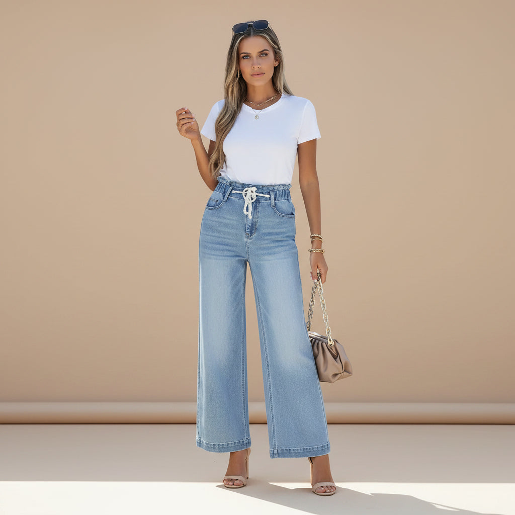 Full length view of women's high waist wide leg denim jeans