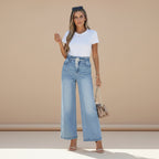 Full length view of women's high waist wide leg denim jeans