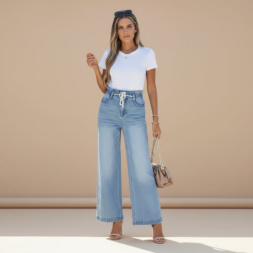 Full length view of women's high waist wide leg denim jeans