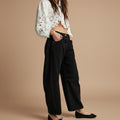 Women's mid rise baggy wide leg barrel denim jeans stone washed stretch casual pants front view