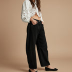 Women's mid rise baggy wide leg barrel denim jeans stone washed stretch casual pants front view