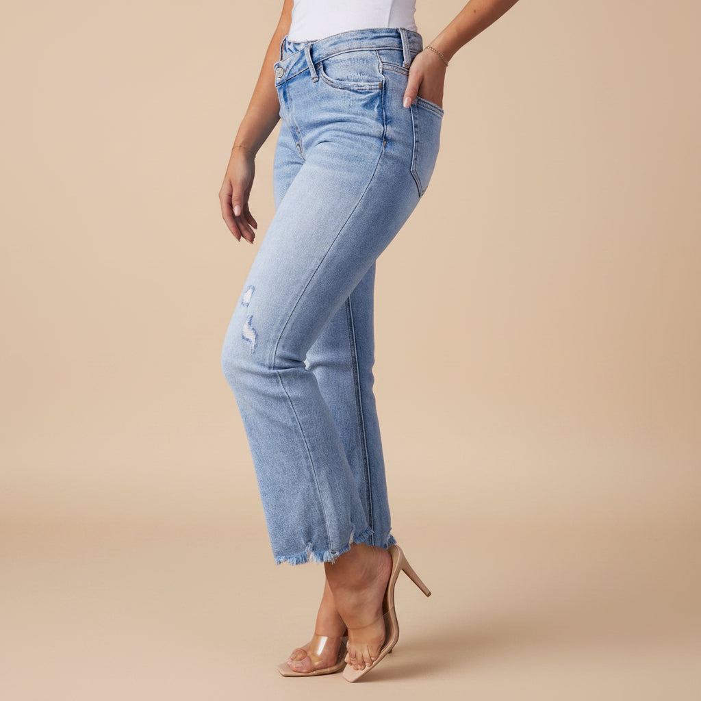 Women's washed distressed ripped cotton denim jeans side view